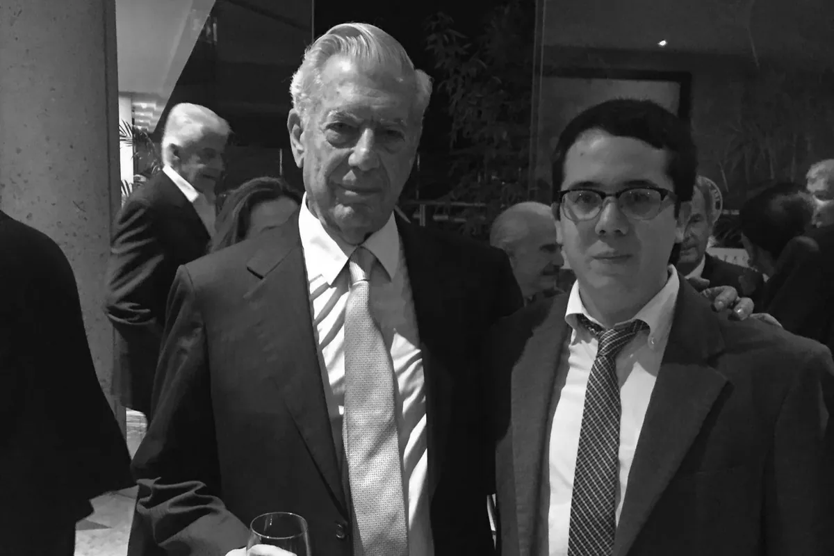 Johannes with Mario Vargas Llosa at an evening reception