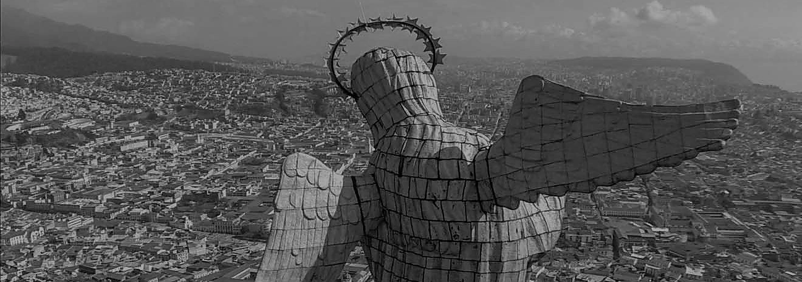 The Virgin of Panecillo overlooking the Cotopaxi volcano near Quito, Ecuador.
